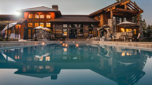 large house ski chalet with pool in front